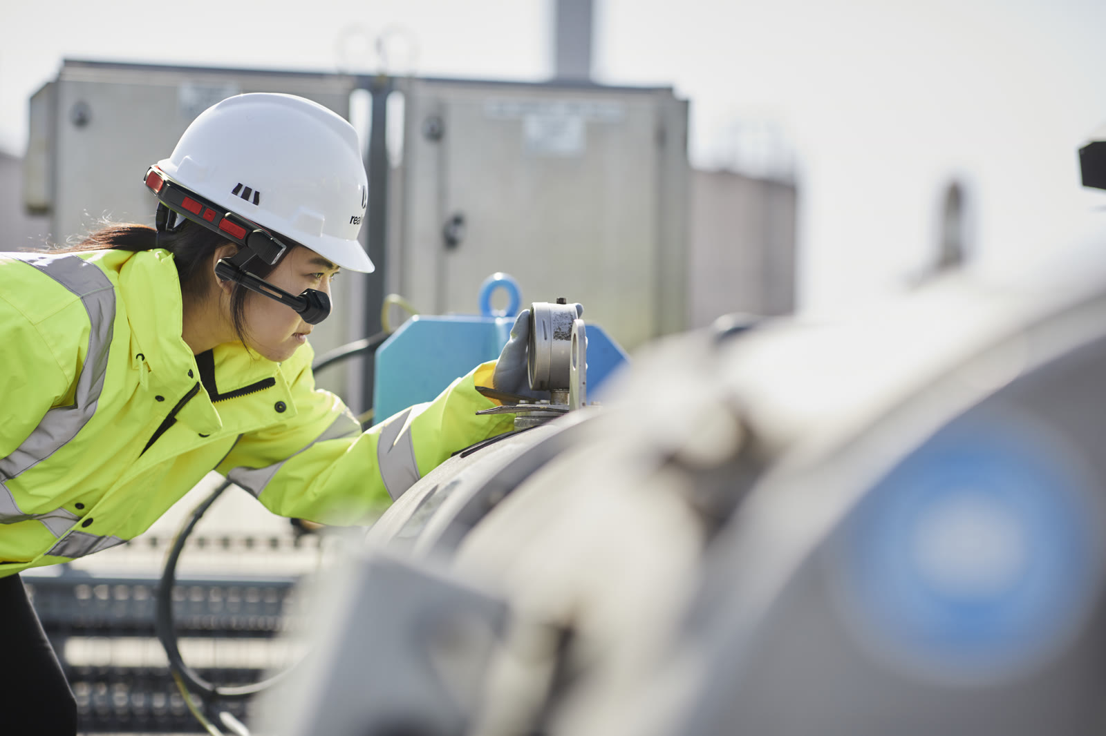 Frontline worker using a RealWear assisted-reality headset